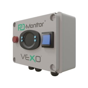 A VEXO PD-Monitor device, featuring a compact, rectangular grey enclosure with a circular control interface, blue function buttons, a red emergency stop button, and a blue display screen. The unit is designed for monitoring and managing fluid dynamics in building systems.