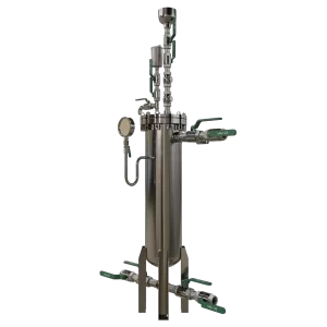 VEXO X-POT XXP A cylindrical stainless-steel multi-purpose filtration unit with various valves, including green VEXO-branded handles, a pressure gauge, and a brass air vent at the top. The unit is designed high flow high pressure heating and cooling systems, integrating magnetic filtration, dirt separation, and chemical dosing in one compact device.